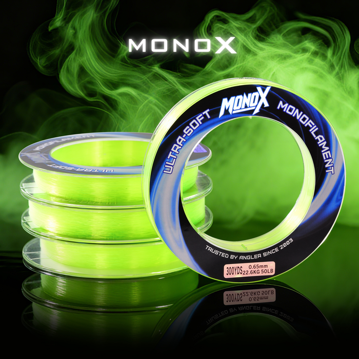 Neon green monofilament fishing line spools labeled ultra-soft, with bold MONOX branding.